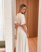 Korbela Dress in Beige womens beige linen midi dress back view