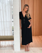 Korbela black linen midi dress with button-up front, styled view