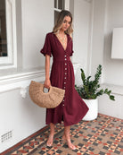 Korbela bordeaux linen midi dress, front view