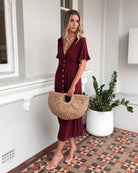 Korbela Dress in Bordeaux womens bordeaux linen midi dress styled outfit