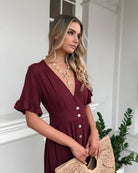 Korbela Dress in Bordeaux bordeaux linen midi dress back view