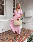 Korbela Dress in Powder Pink soft pink linen blend midi dress full length view