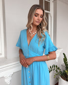 Korbela sky blue linen midi dress, detail view