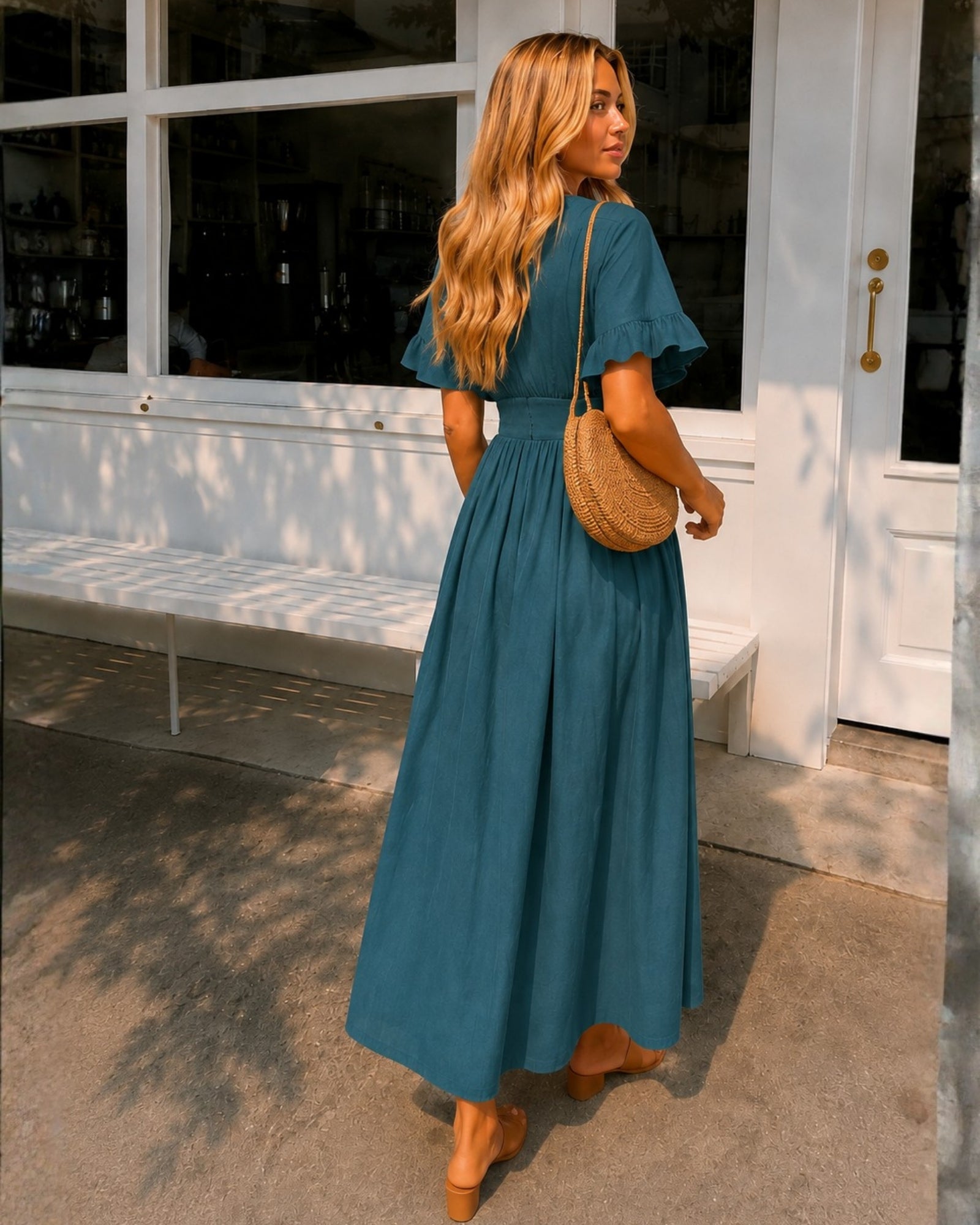 Women's deep green linen midi dress side view, the Korbela Dress in Deep Green by Esther & Co