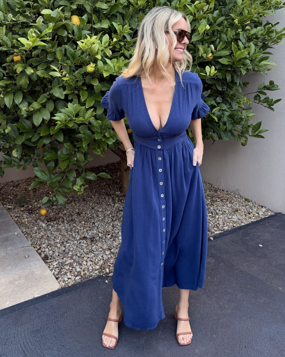 Korbela navy spot print linen midi dress, back view
