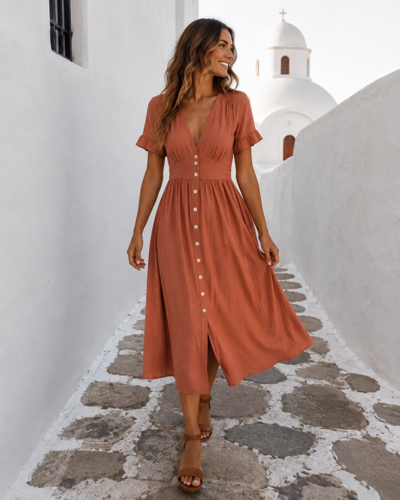 Women's rust linen midi dress with V neckline and button-up front, the Korbela Dress in Rust by Esther & Co