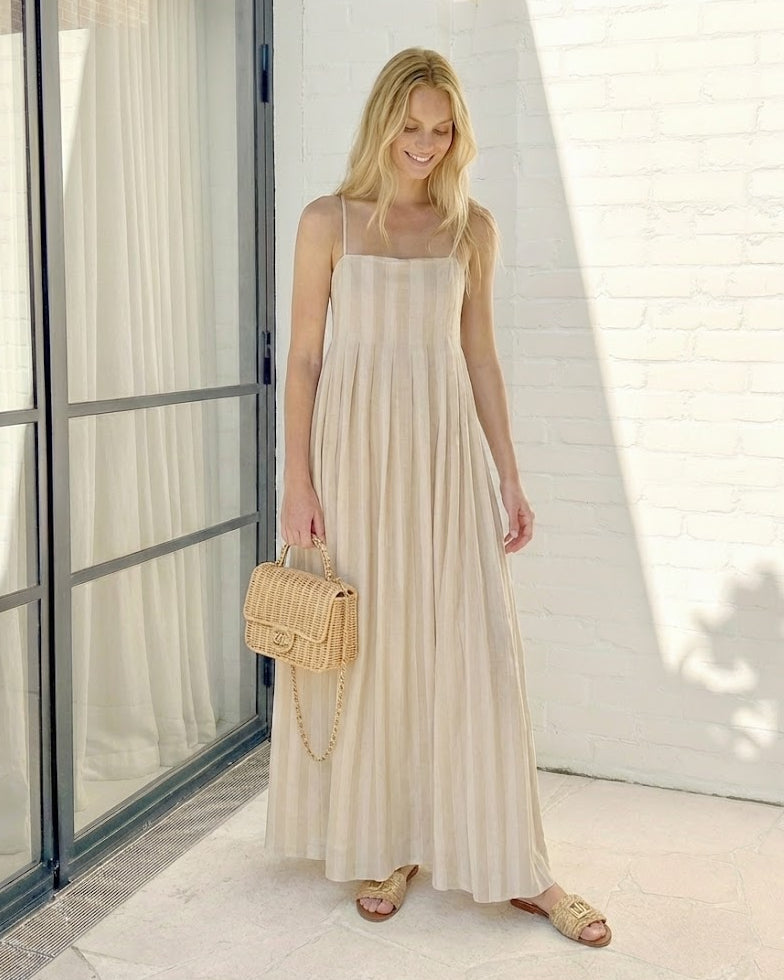 Women's beige stripe maxi dress styled outfit by Esther & Co