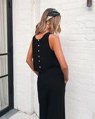 Back view of the women's black linen crop top showing the button up detail by Esther & Co