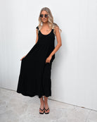 Lydia black tiered linen midi dress, styled view
