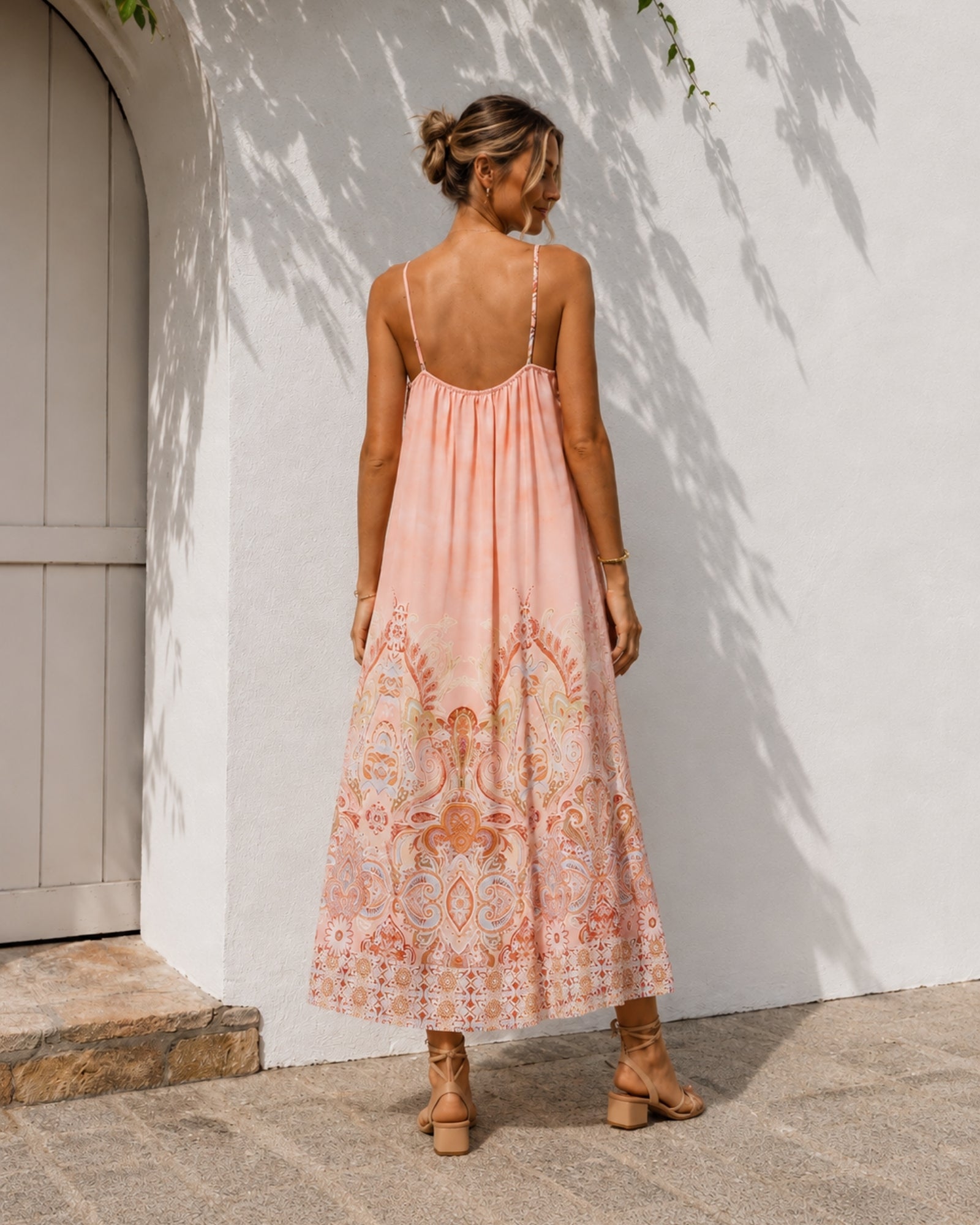 Women's blush lace maxi dress side view by Esther & Co