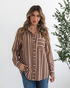Women's lightweight chocolate stripe collared shirt styled with denim by Esther & Co