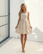 Women's beige floral mini dress front view by Esther & Co