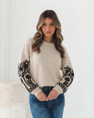 Mohanna Latte knit jumper with black floral embroidery, front view by Esther & Co