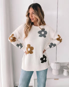 Women's soft cream knit jumper with all over floral design by Esther & Co