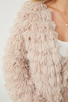 Ophelle Jacket in Beige beige fluffy fringe jacket styled casual look