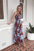 Women's blue floral maxi dress styled outfit by Esther & Co