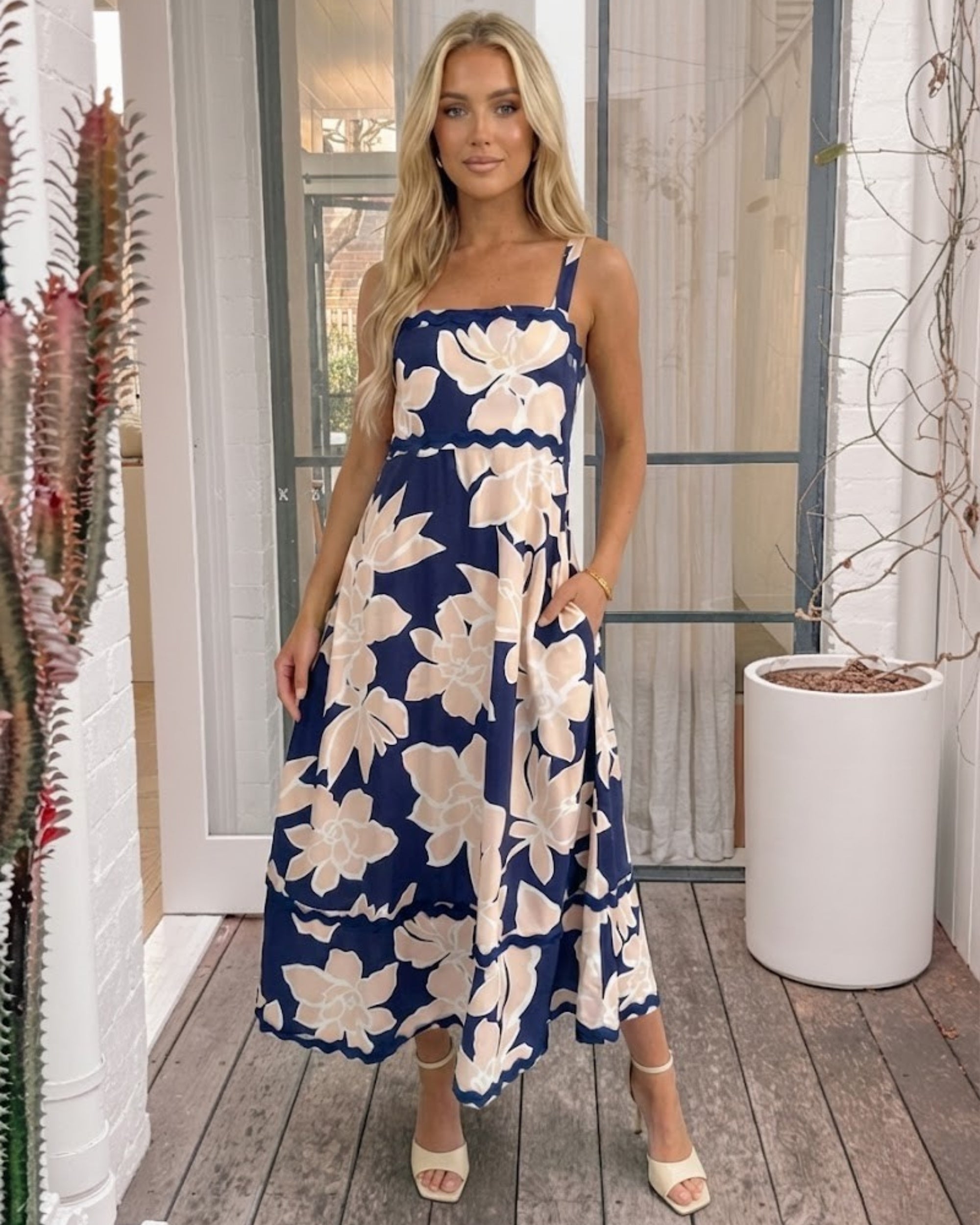 Women's navy floral maxi dress styled outfit by Esther & Co