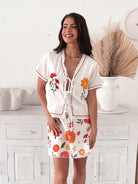 Women's white multicoloured floral mini skirt by Esther & Co