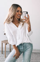 Plato Top in White white structured blouse detail view