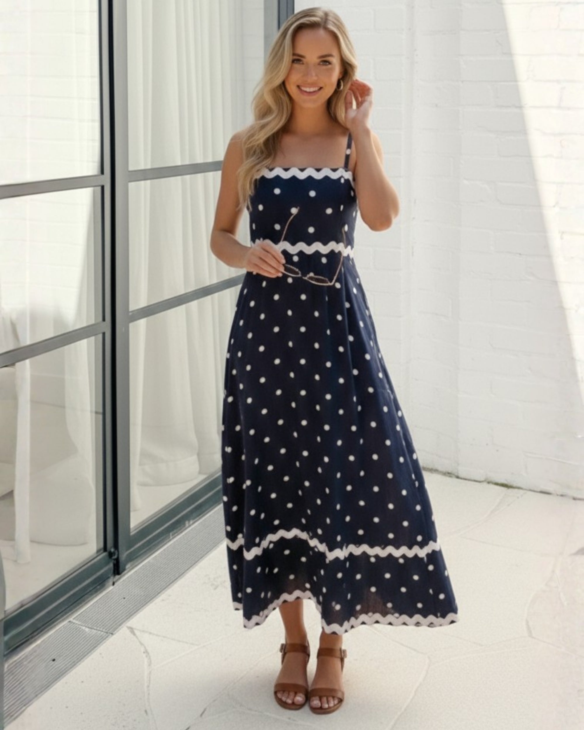 Women's navy spot midi dress styled outfit by Esther & Co