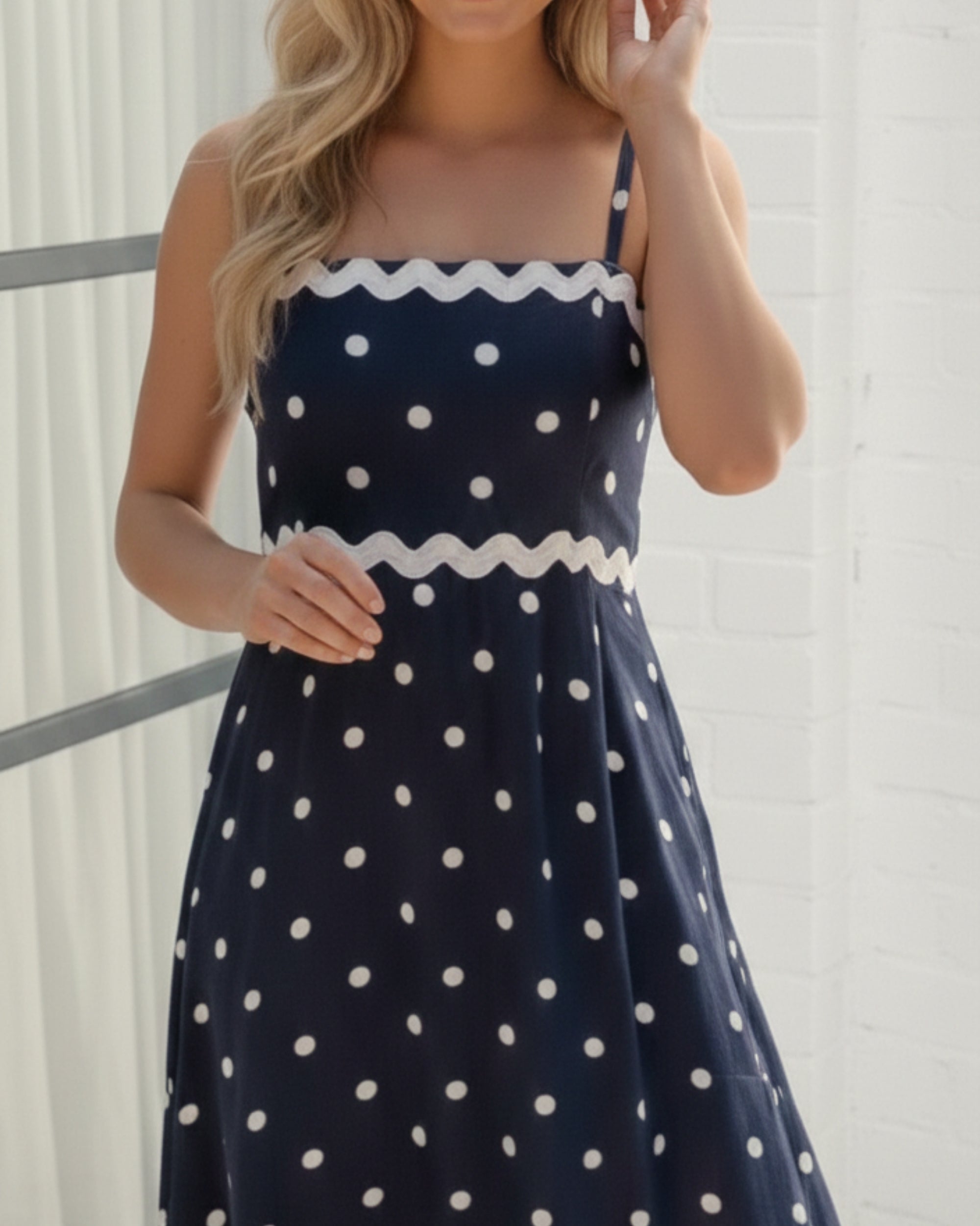Women's navy spot midi dress front view by Esther & Co