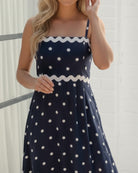 Women's navy spot midi dress front view by Esther & Co