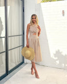 Rafiya Dress in Tan Stripe tan stripe midi dress with cutout waist full length