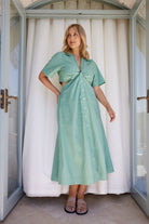 Women's sage poplin midi dress with twist waist cutout by Esther & Co