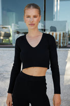 Women's black v neckline knit top front view by Esther & Co