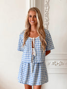 Women's blue check skirt styled with the matching Revan top by Esther & Co