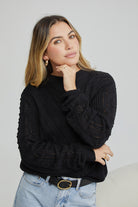 Rheane Knit in Black black all-over patterned knit jumper side view