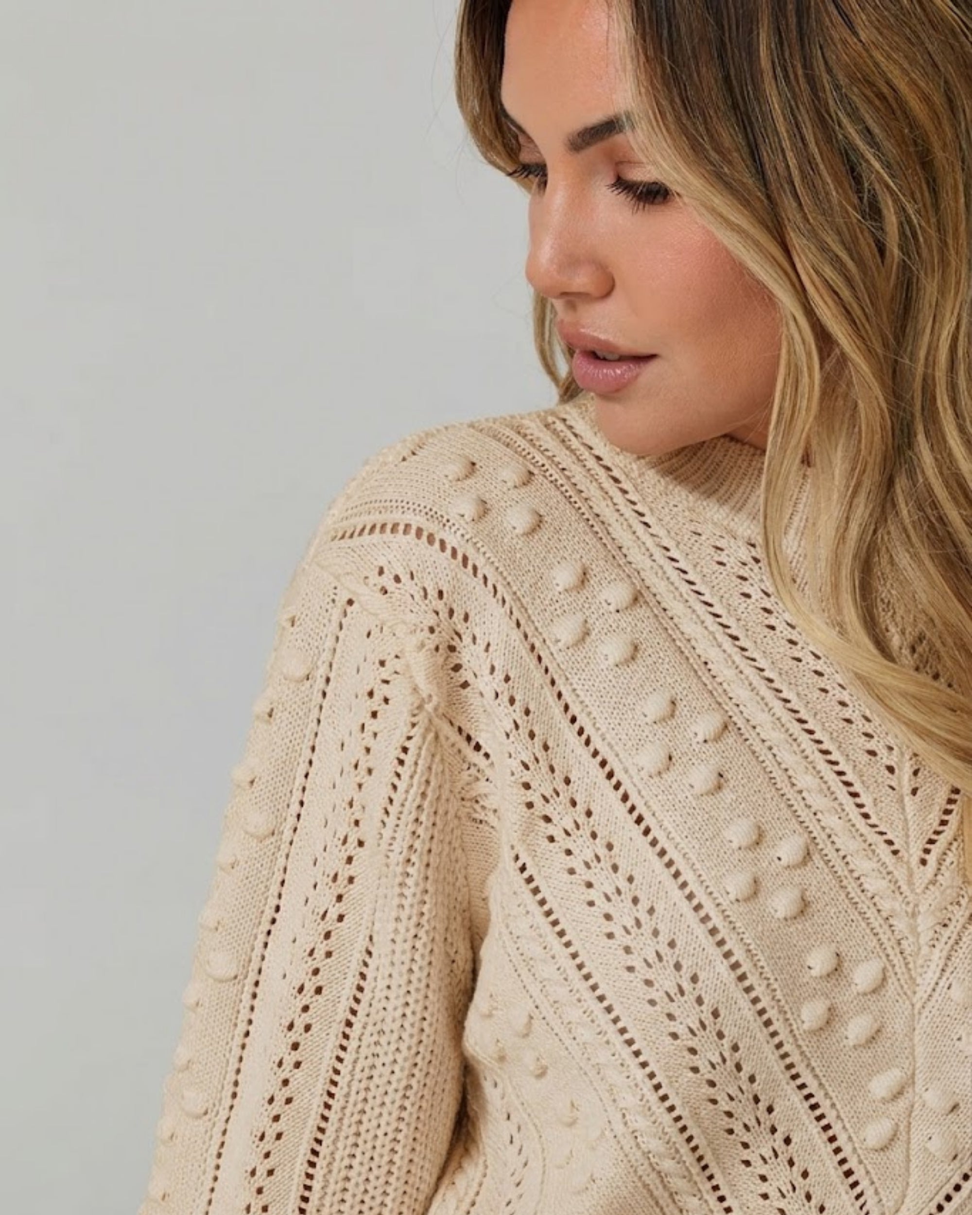 Rheane Knit in Latte latte pointelle stitch knit with chevron motif side view
