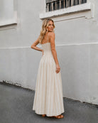 Women's beige stripe maxi dress styled outfit by Esther & Co