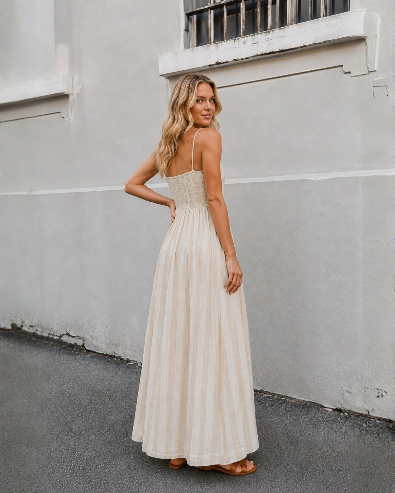 Women's beige stripe maxi dress styled outfit by Esther & Co