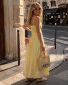 Women's yellow stripe maxi dress full length view by Esther & Co
