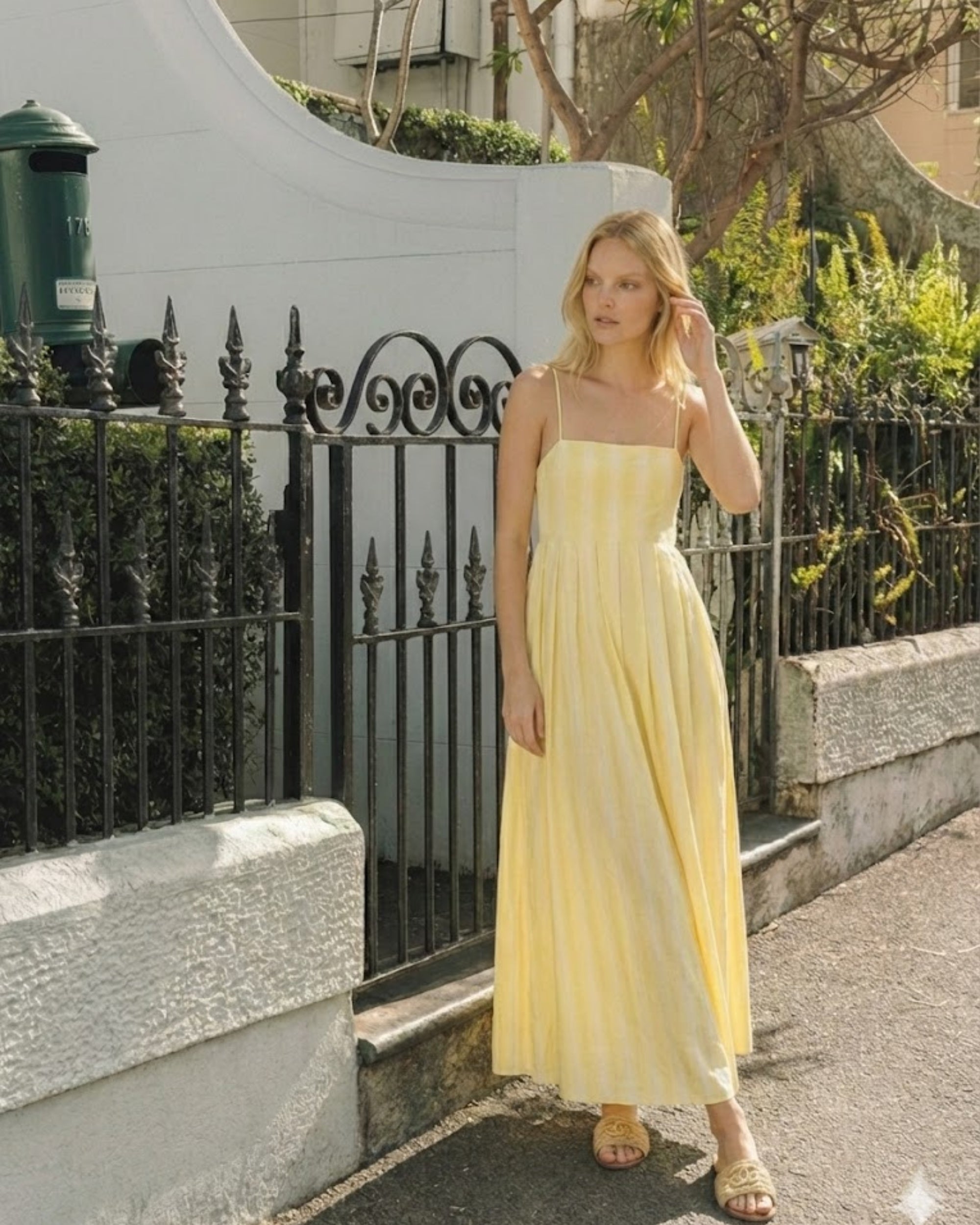 Women's yellow stripe maxi dress detail view by Esther & Co