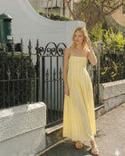 Women's yellow stripe maxi dress detail view by Esther & Co