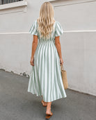 Women's green stripe midi dress with V-neckline detail by Esther & Co