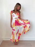 Women's white yellow and pink floral a-line maxi dress with sweetheart neckline, the Rollene Dress in Multi by Esther & Co