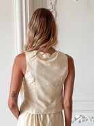 Women's yellow sleeveless tie front top back view by Esther & Co
