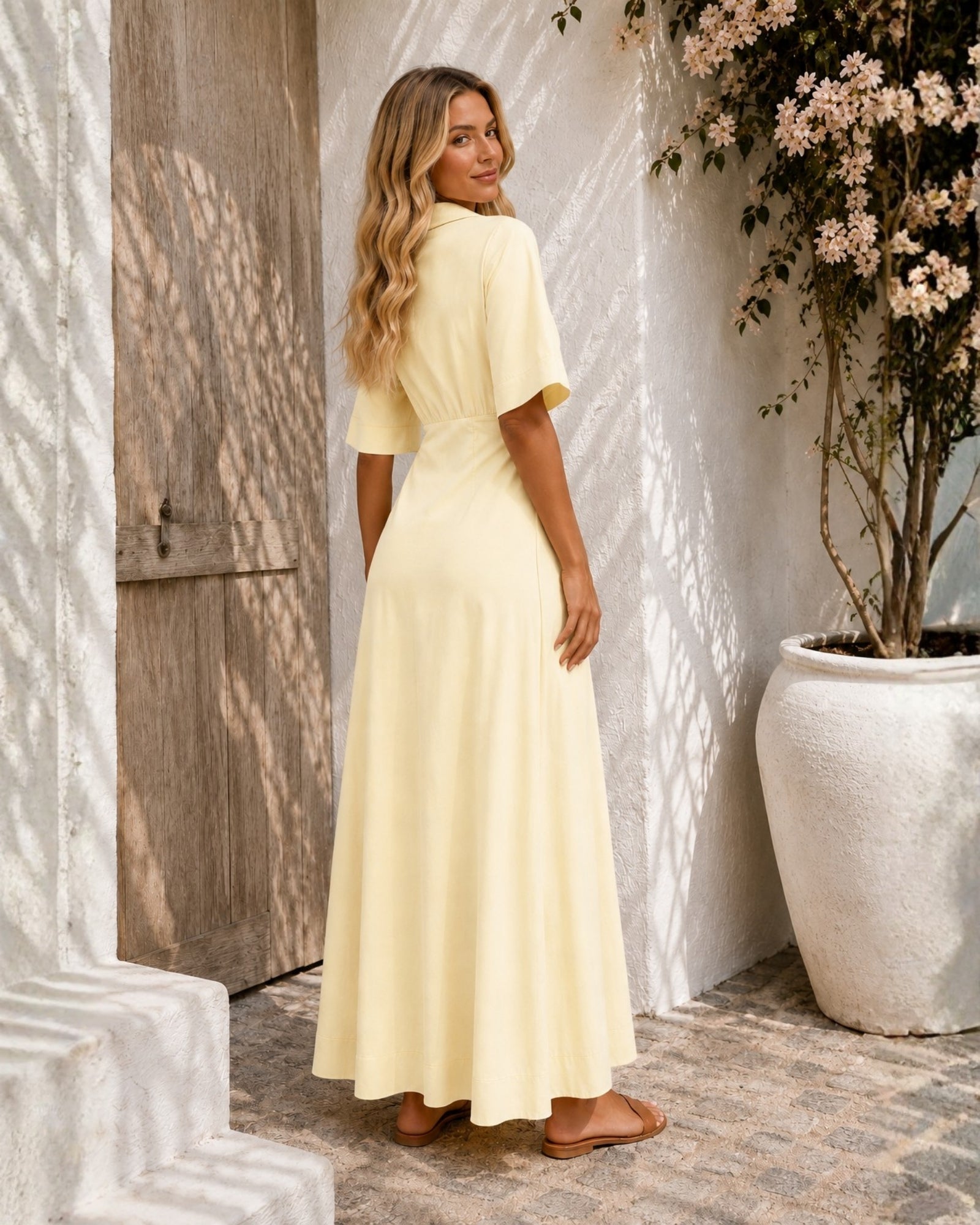 Women's pastel yellow v-neck wrap dress with collar, the Sephora Dress in Buttercream by Esther & Co