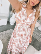 Women's peach floral flowy maxi dress by Esther & Co