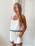 Women's white high waisted linen blend shorts with string and side pockets, the Solara Shorts in White Multi by Esther & Co