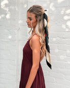 Sonya Dress in Bordeaux bordeaux linen spaghetti strap midi dress back view