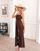 Back view of the Syvella Dress in Brown Floral by Esther and Co showing the open back and floral print detail