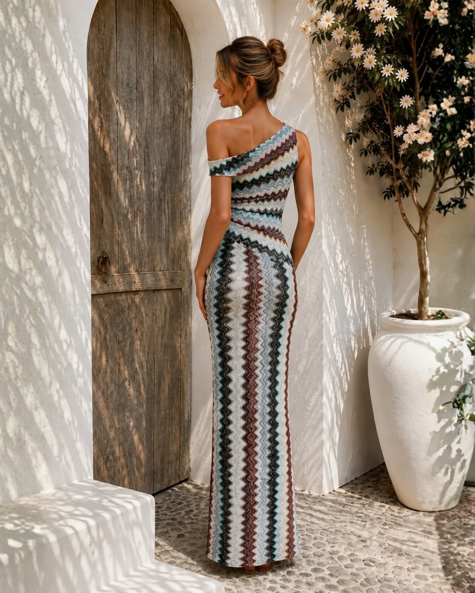 Women's one shoulder geometric knit maxi dress side view, the Thandie Dress in Geometric Waves by Esther & Co