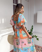 Tomika Dress in Multi Print multi print tea length midi dress back view