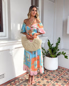 Tomika Dress in Multi Print womens multi print printed midi dress styled with sandals