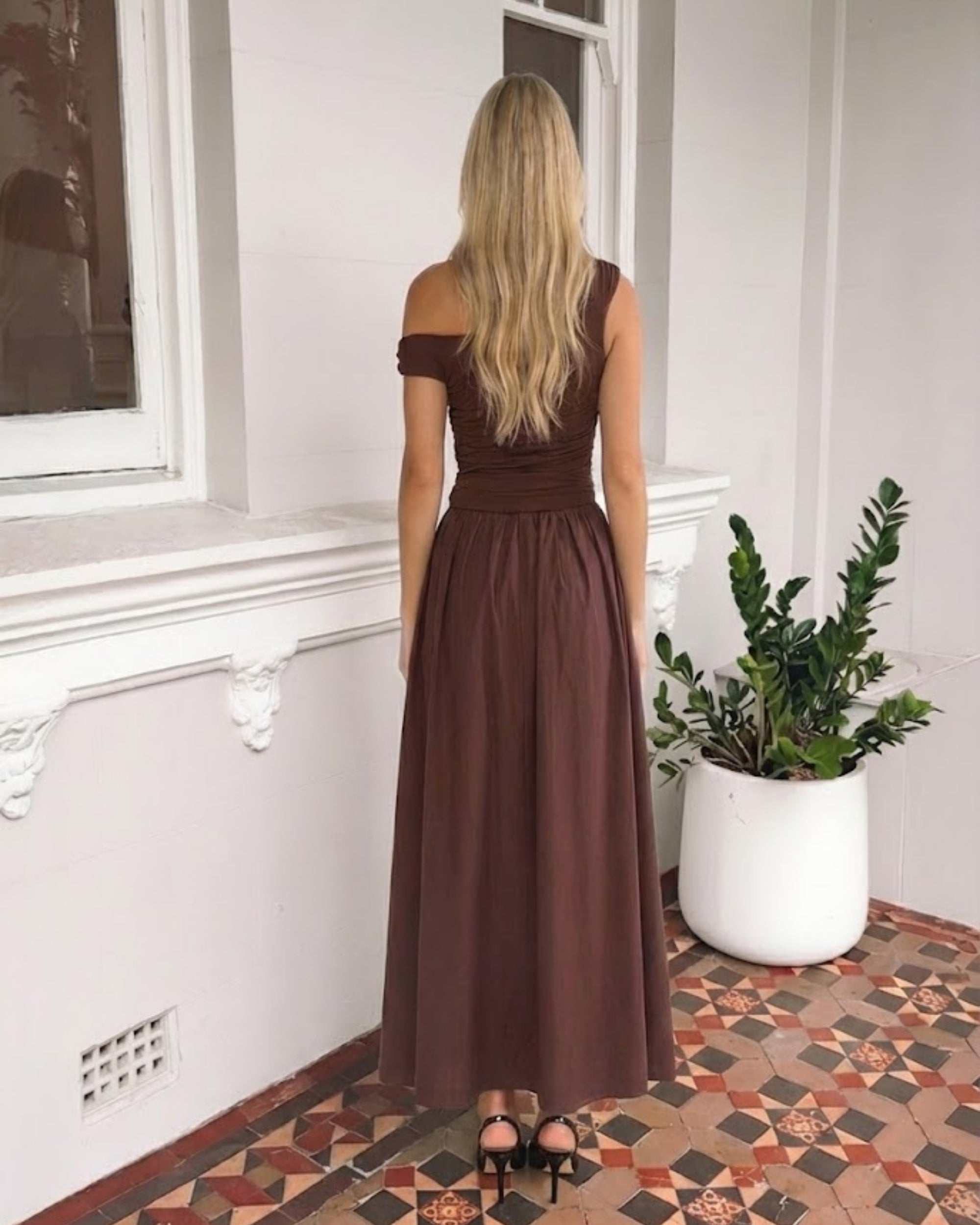 Women's brown ruched maxi dress styled outfit by Esther & Co