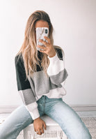 Brandy Knit in Black drop shoulder black knit jumper with cinched bishop sleeves side view